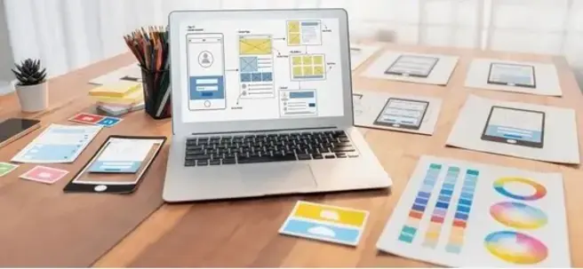 Developer coding UI/UX design for mobile app development on laptop Developer coding UI/UX design for mobile app development on laptop
